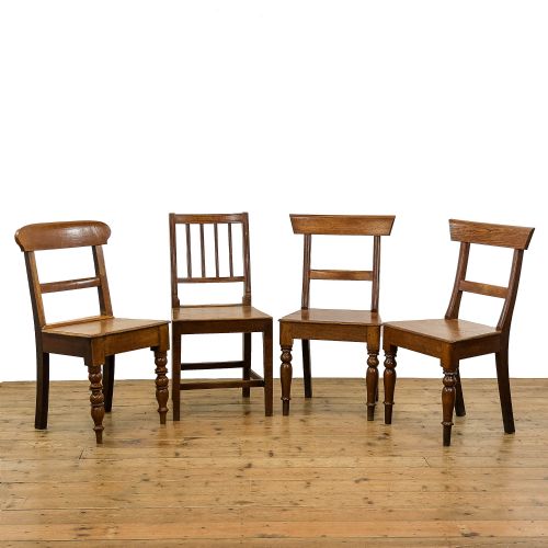 Harlequin Set of Four Antique Oak Farmhouse Chairs