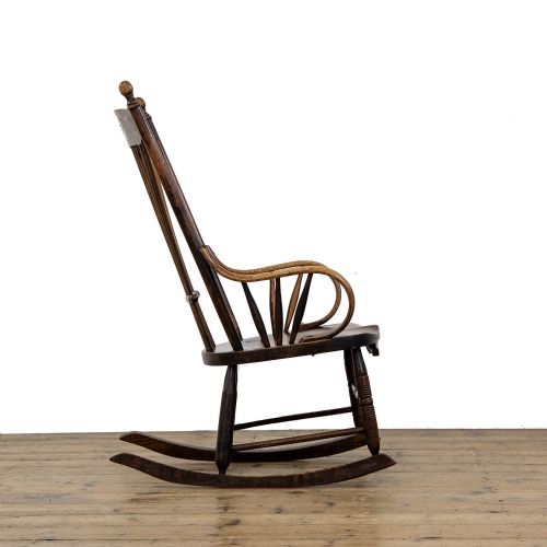 fig 2. Antique Spindle Fan back Rocking Chair