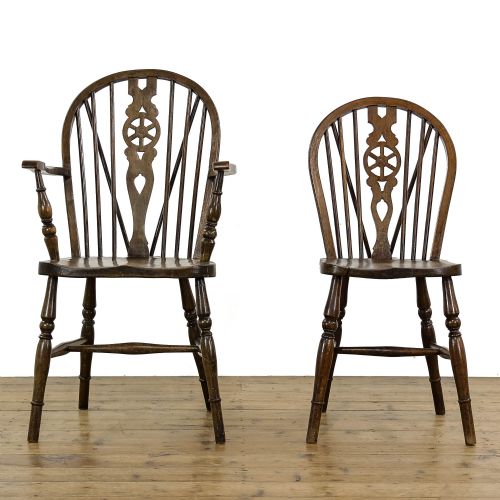 fig 1. Antique Set of Nine Wheelback Dining Chairs