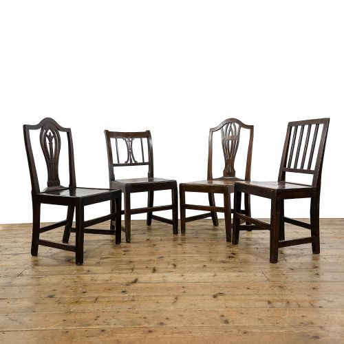 Harlequin Set of Four Antique Oak Chairs
