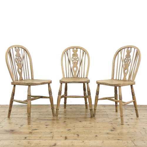 Three Antique Pine Wheelback Kitchen Chairs

