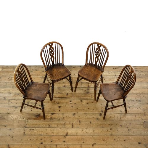 fig 1. Four Antique Ash and Elm Wheelback Chairs