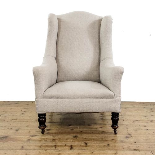 fig 1. Antique Upholstered Cream Wing Back Armchair
