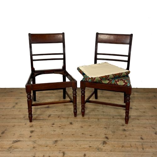 fig 2. Set of four antique mahogany dining chairs with horizontal bar backs, turned front legs, and patterned drop-in upholstered seats.
