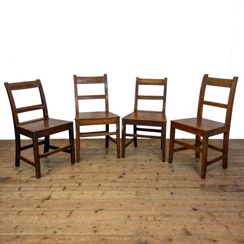 ANTIQUE HARLEQUIN SET OF FOUR WELSH OAK CHAIRS