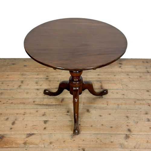 fig 1. An antique mahogany tilt-top occasional table featuring a round circular top, turned central column pedestal, and three splayed cabriole legs with pad feet.