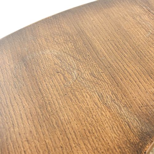 fig 1. An antique dark oak horseshoe-shaped hunt table featuring upright trestle supports and a curved base stretcher.