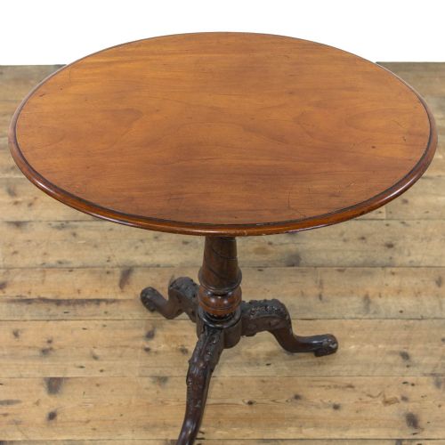 A Victorian mahogany side table featuring a round polished top supported by a spiral-turned pedestal shaft and carved tripod legs. View III