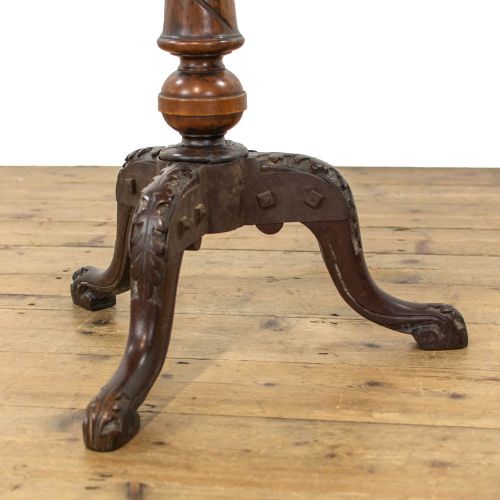 A Victorian mahogany side table featuring a round polished top supported by a spiral-turned pedestal shaft and carved tripod legs. View V