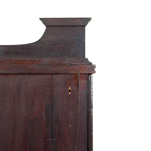 fig 1. An antique dark wood Art Nouveau display cabinet featuring floral marquetry inlays, a single glazed glass door, and a shaped cresting gallery.