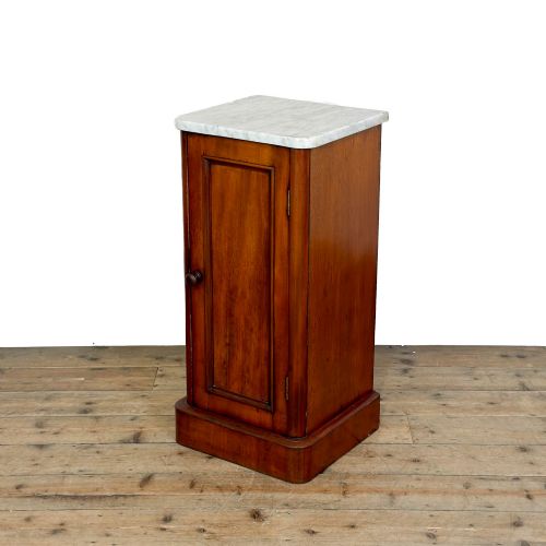 fig 1. A Victorian mahogany pot cupboard featuring a single panelled door with a turned handle and a white marble top.