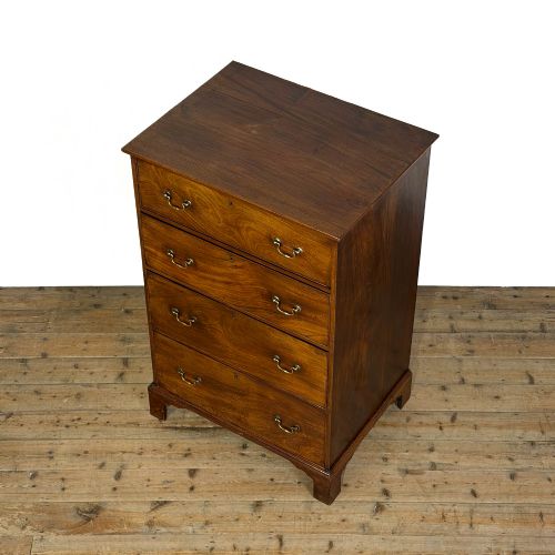 fig 1. A four-drawer Georgian chest of drawers crafted from dark mahogany wood featuring brass swan-neck handles and bracket feet.
