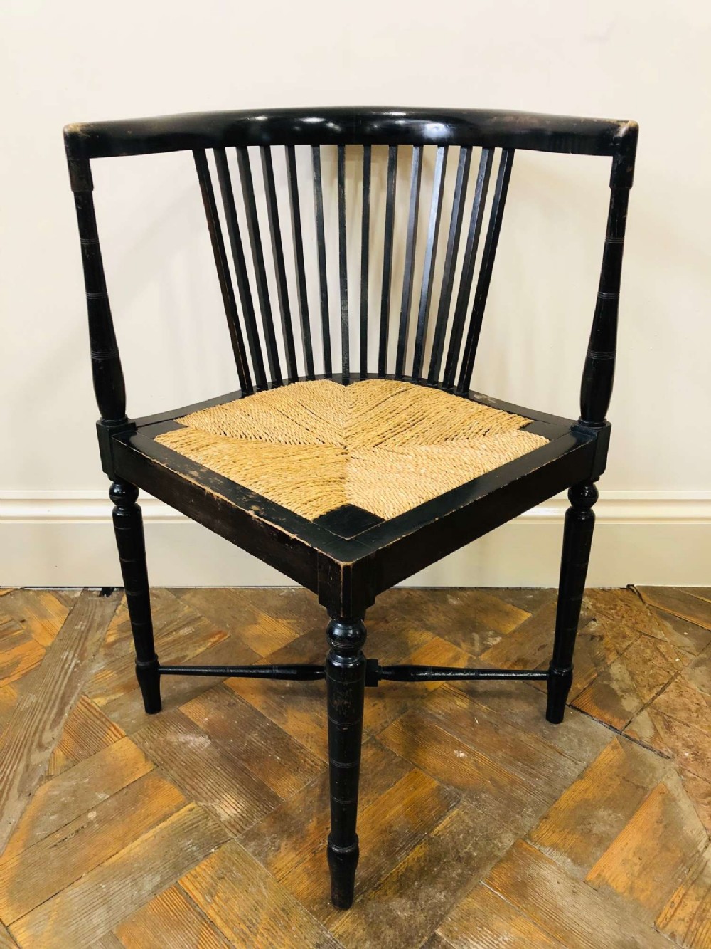 Ebonised Arts and Crafts Corner Chair with Rush Seat