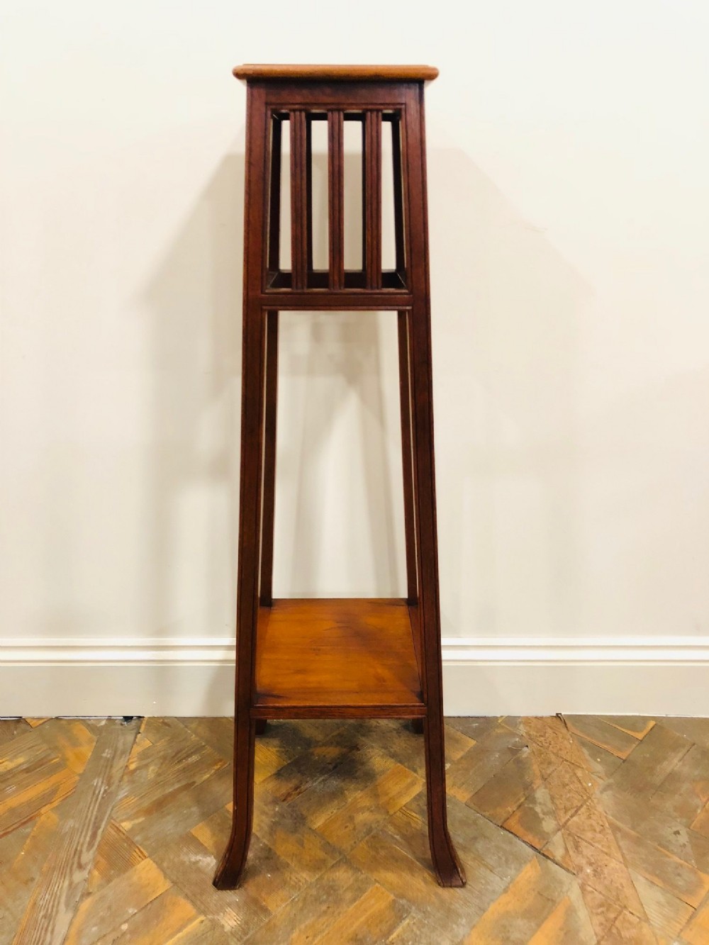 An Oak Arts and Crafts Torchere Stand 