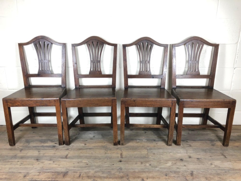 Set of Four Early Welsh Oak Camel Back Chairs