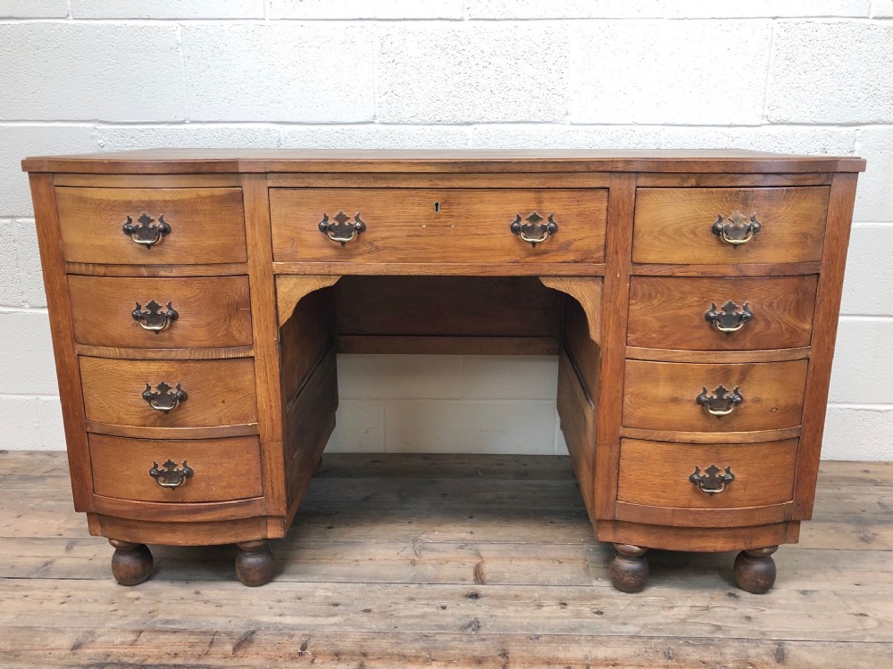 Antique Bow Front Pedestal Kneehole Desk