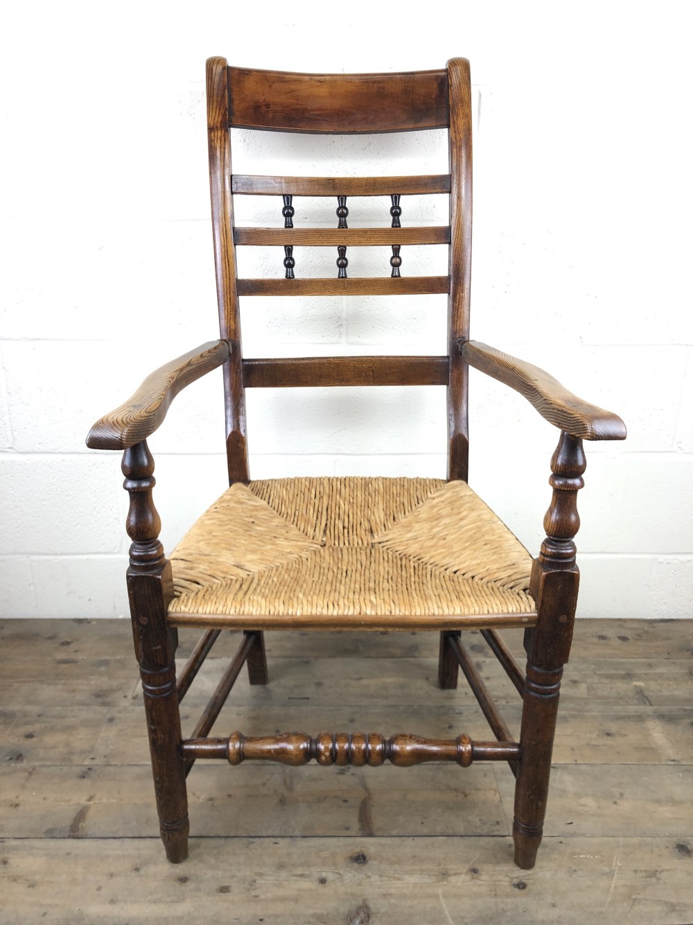 Antique Elm Spindle Back Armchair with Rush Seat