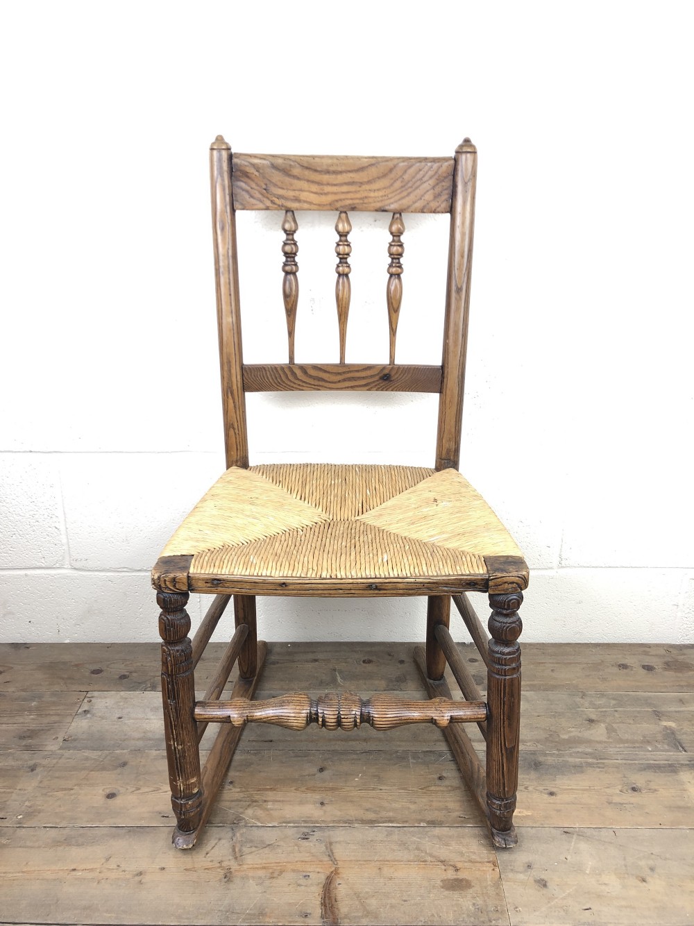 Antique Ash and Elm Rocking Chair with Rush Seat