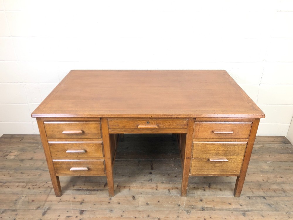 Early 20th Century Oak Desk with Six Drawers View II