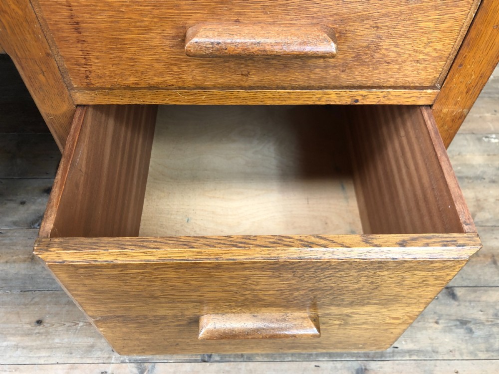 Early 20th Century Oak Desk with Six Drawers View V