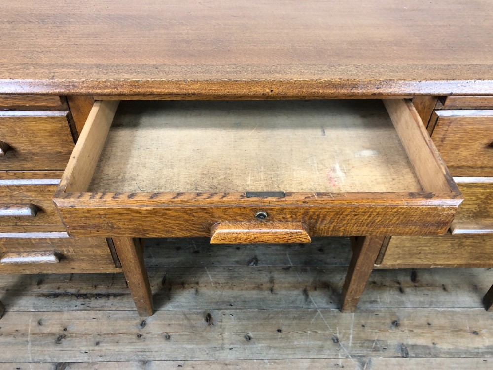 Early 20th Century Oak Desk with Six Drawers View VI