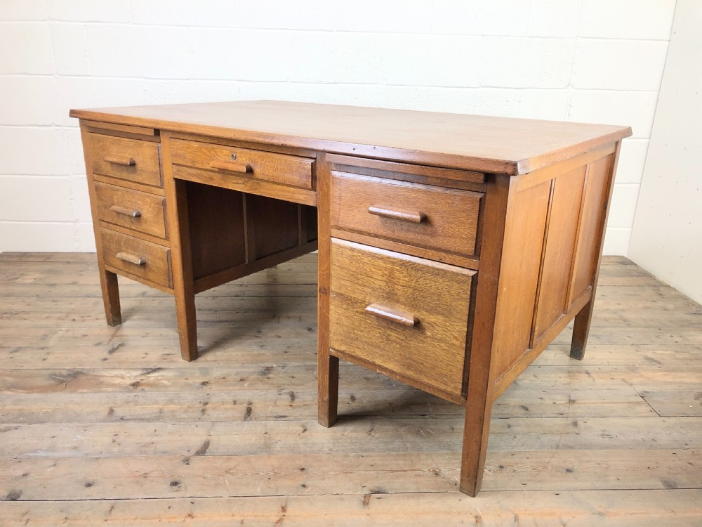 Early 20th Century Oak Desk with Six Drawers View VII