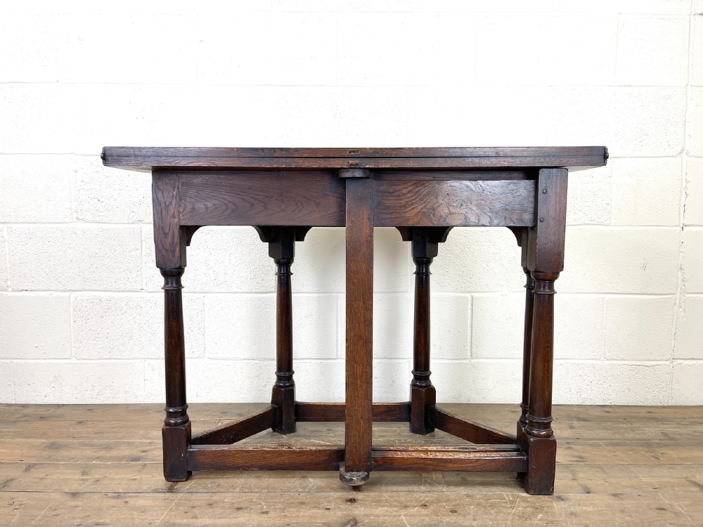 Carved Oak Fold-over Demi Lune Table  View IX