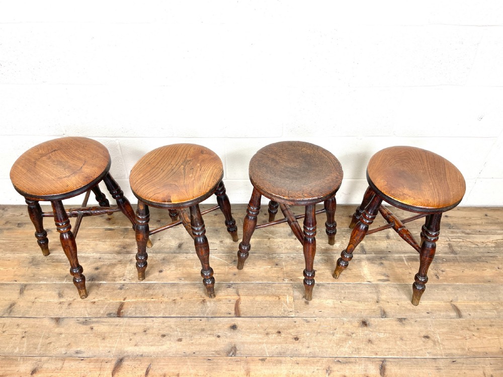 Set of Four Antique Elm Stools View II