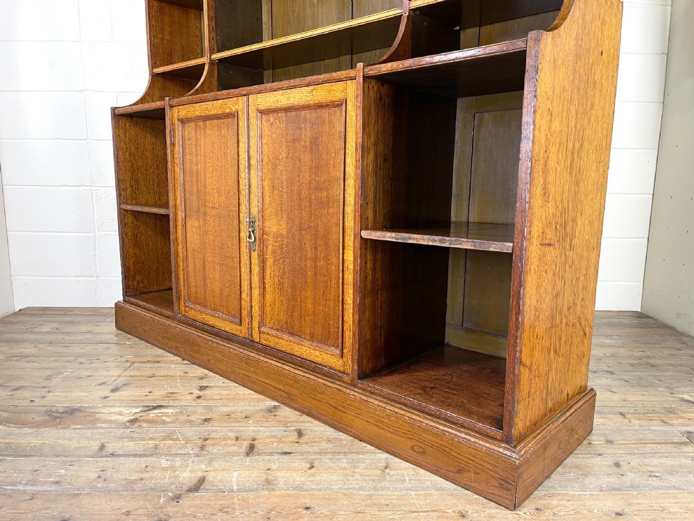 Large Antique Oak Bookcase With Central Cupboard  View IX