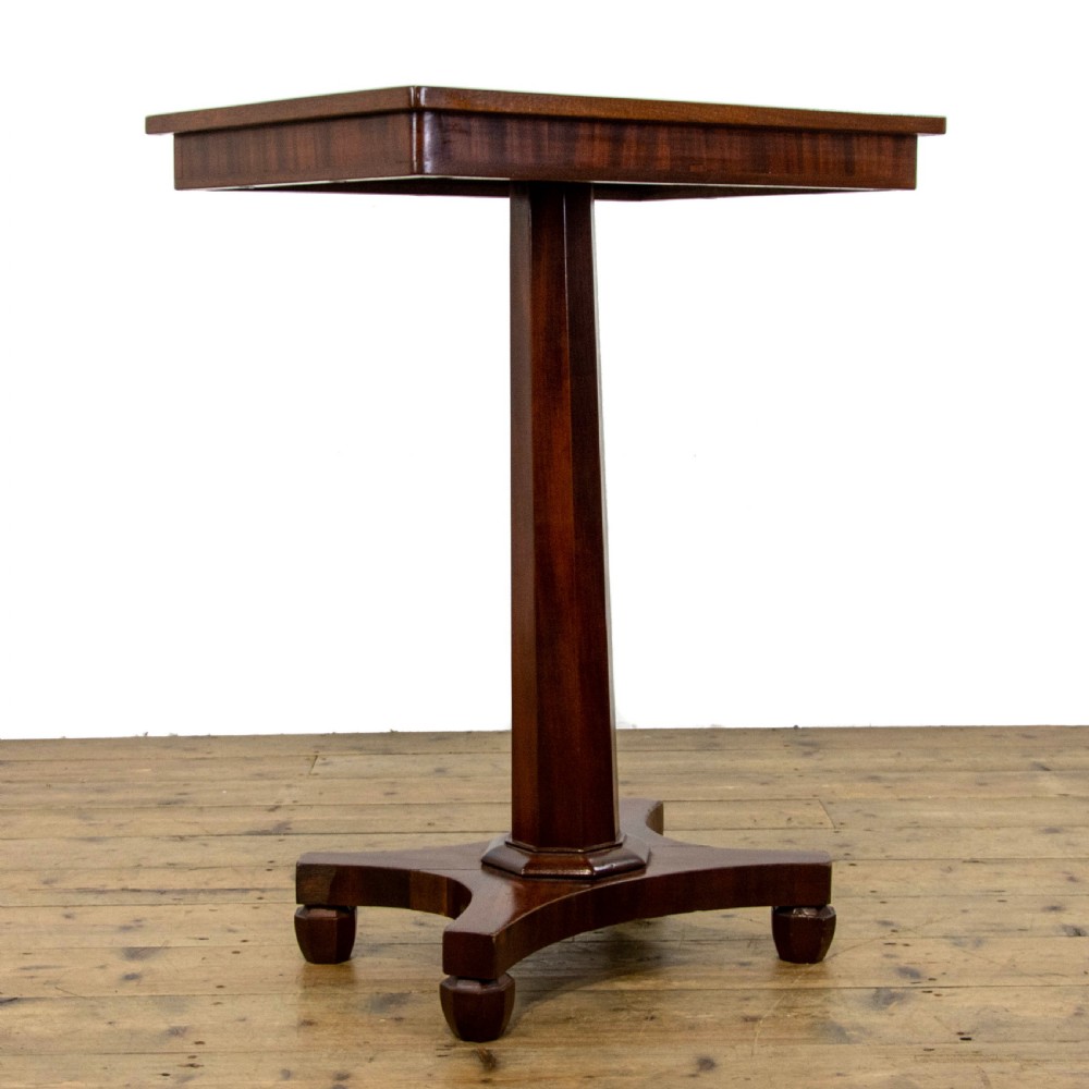 A dark brown mahogany side table featuring a rectangular top with geometric timber inlay, a central octagonal column, and a four-pointed pedestal base. View II