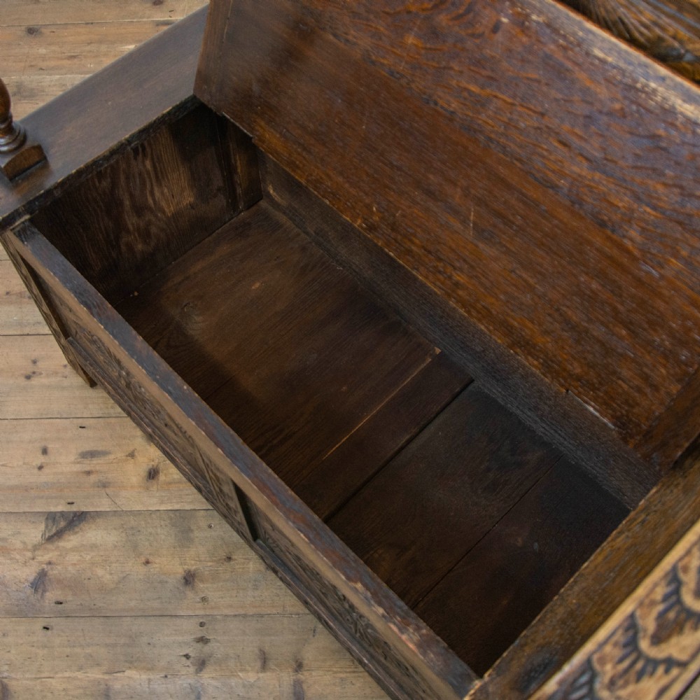 Small Antique Oak Settle with Carved Back View VII