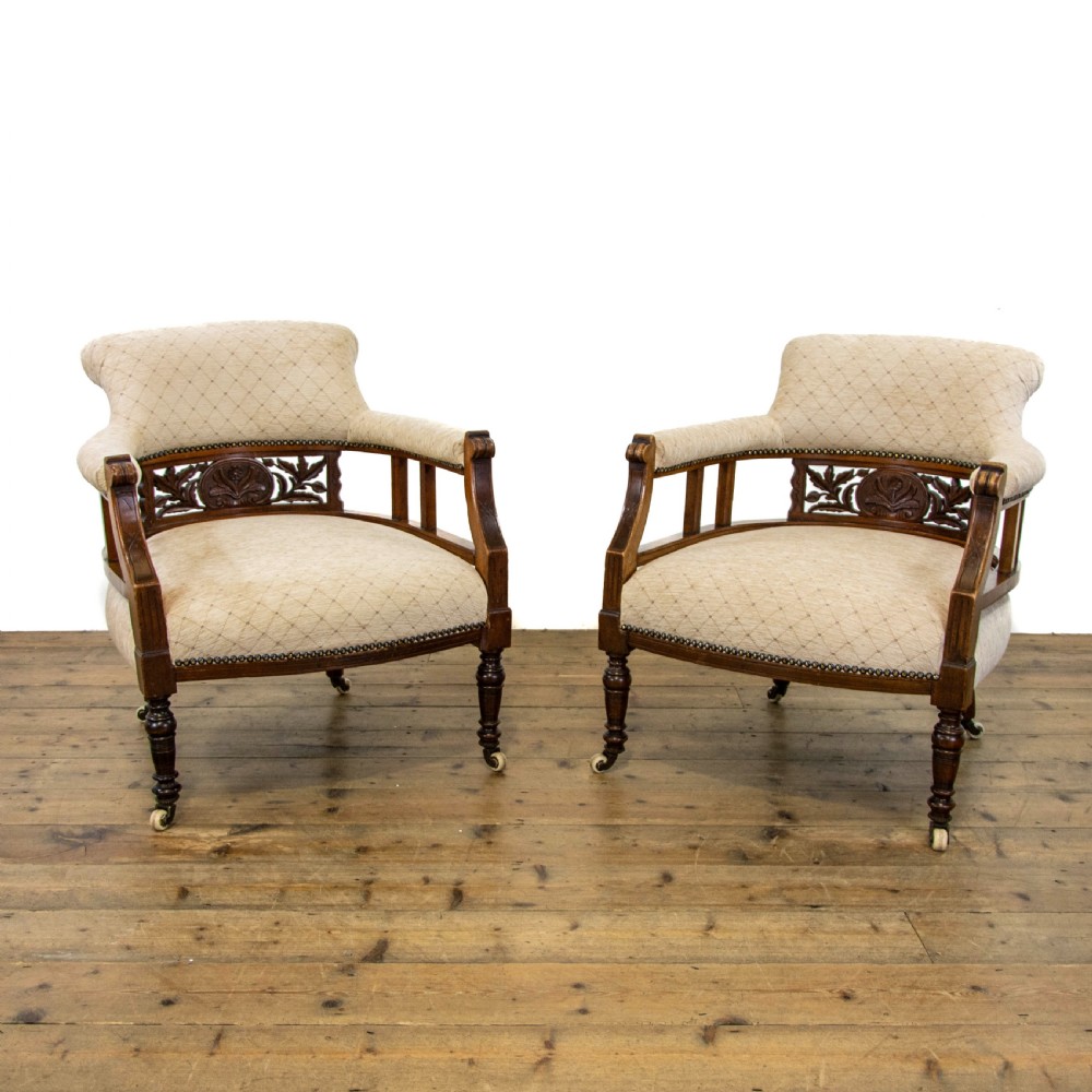 Pair of Victorian Carved and Upholstered Tub Chairs