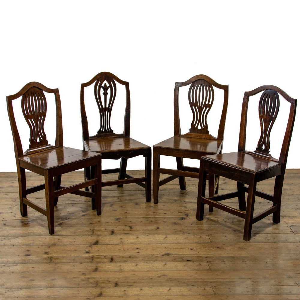 Harlequin Set of Four Antique Welsh Oak Farmhouse Chairs