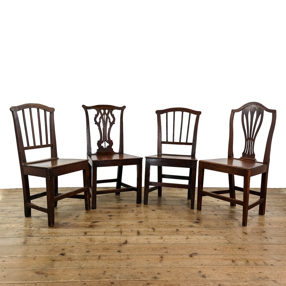 Antique Harlequin Set of Four Oak Chairs