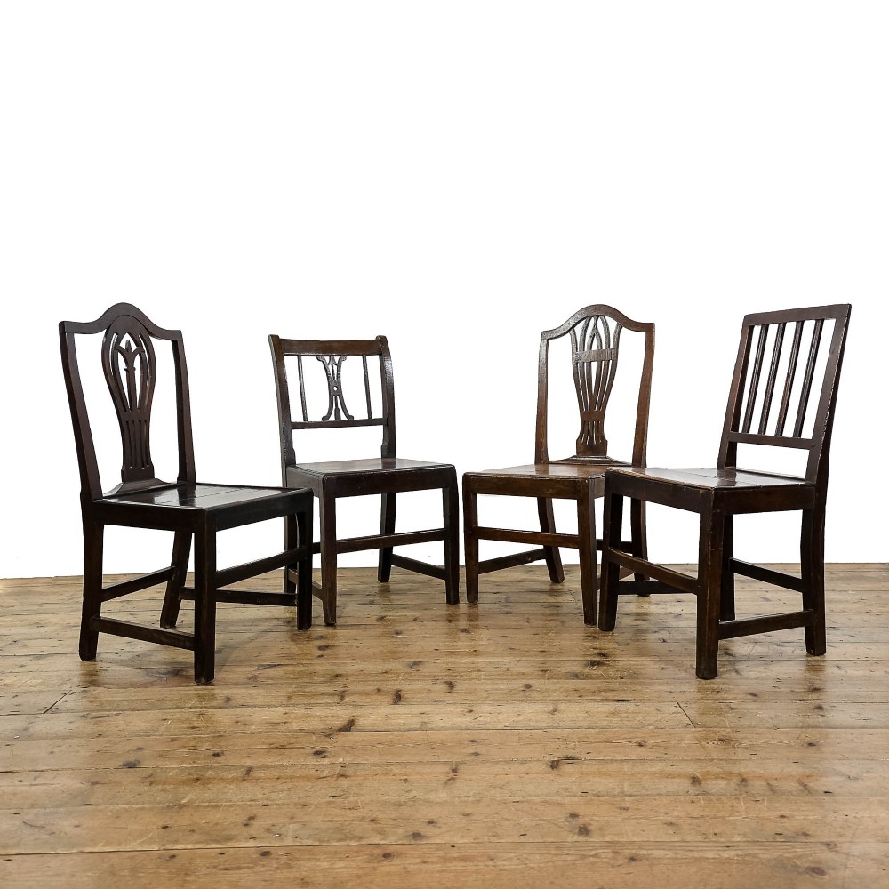 Harlequin Set of Four Antique Oak Chairs
