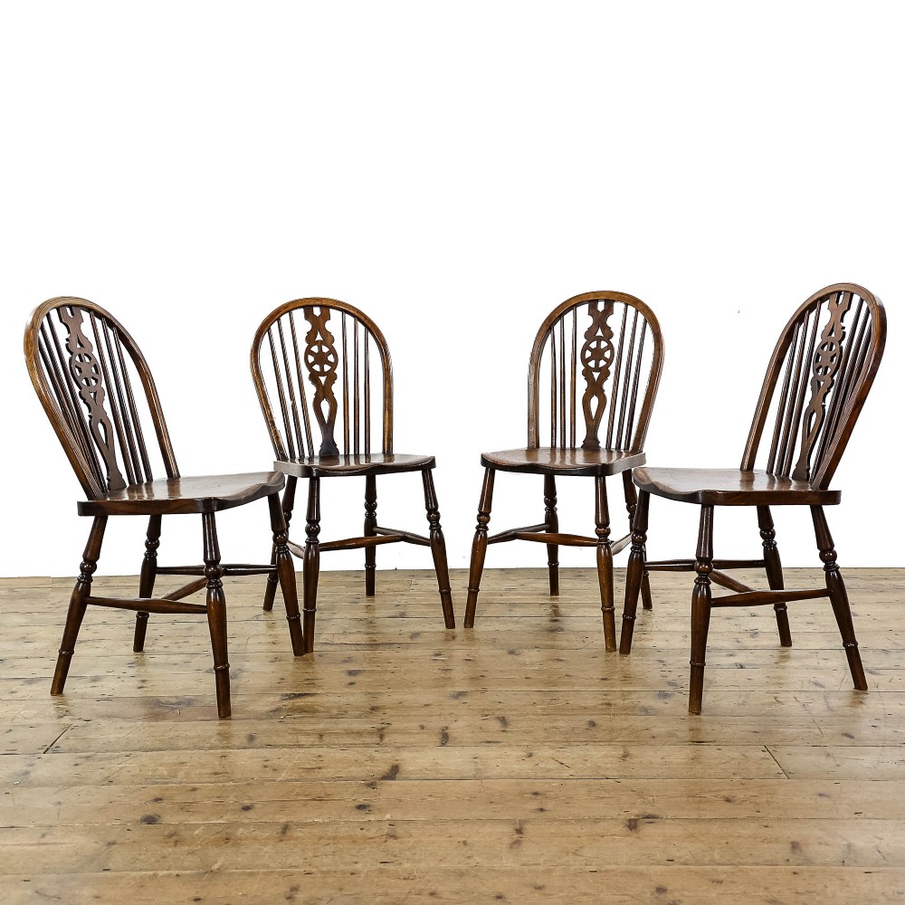 Four Antique Ash and Elm Wheelback Chairs
