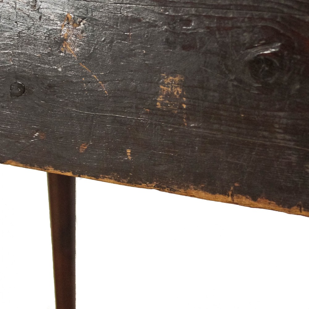 A 19th-century dark mahogany lowboy side table featuring three drawers with brass handles, a scalloped apron, and slender cabriole legs. View VI