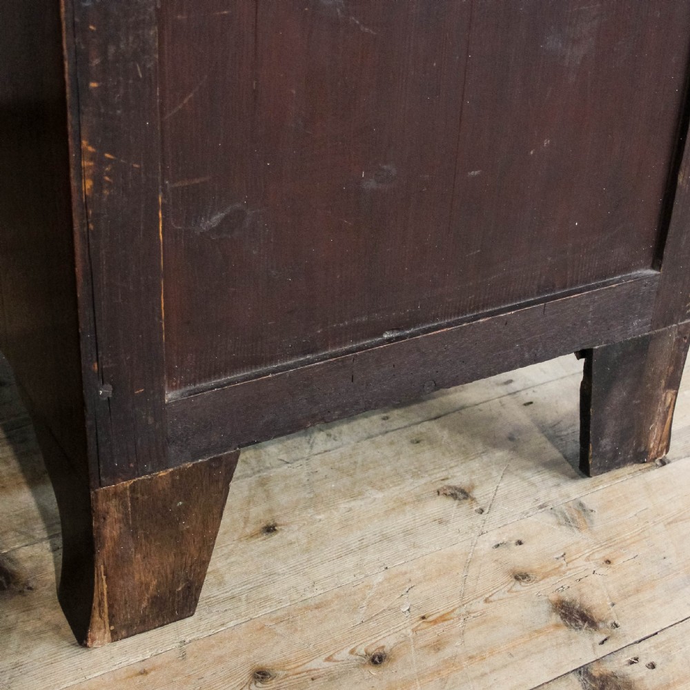 A pair of matching 19th-century mahogany side cabinets with flame mahogany door panels, single upper drawers, and shaped bracket feet. View XI