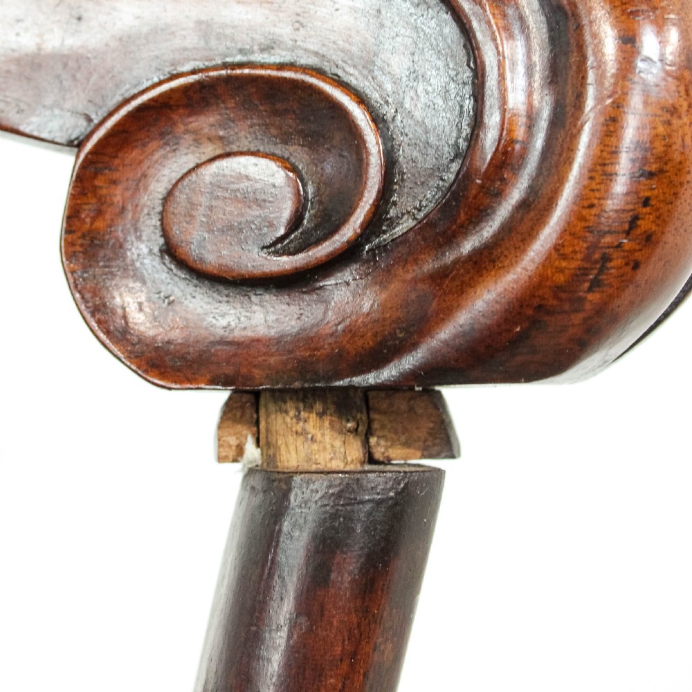 A set of six Victorian mahogany dining chairs with carved scroll backrests and pale green fabric seats. View III
