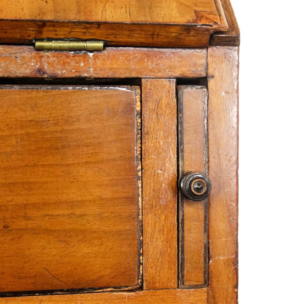 An antique walnut writing bureau featuring a sloping front lid, brass handles, crossbanded inlay borders, and four graduated drawers. View VIII