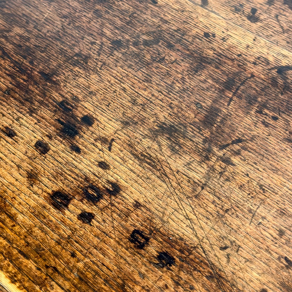 An antique 18th-century oak chest of drawers featuring a two short over three long drawer arrangement, brass handles, and turned bun feet. View VIII