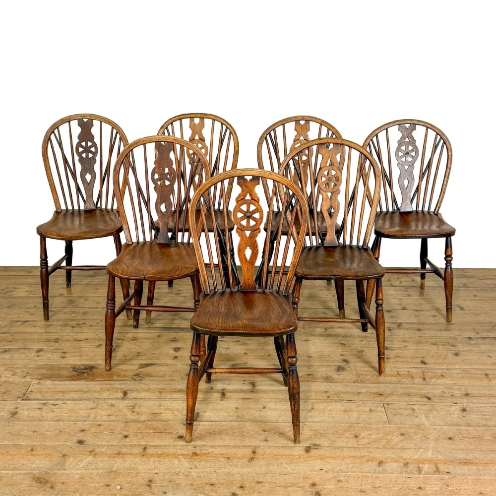 Antique Set of Seven Wheelback Kitchen Chairs
