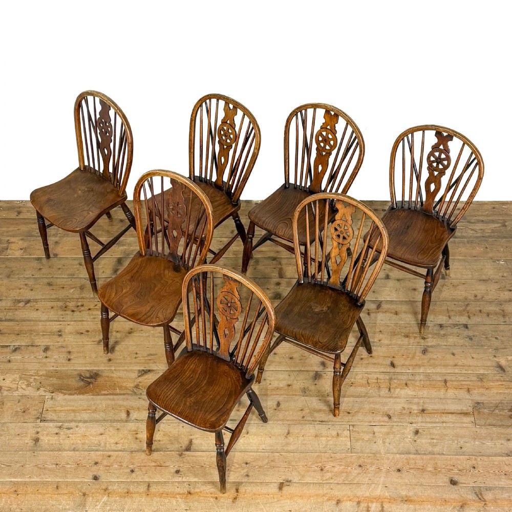 Antique Set of Seven Wheelback Kitchen Chairs
 View II