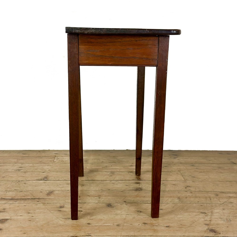 A dark oak rectangular side table featuring a single drawer with a metal drop handle and four straight legs. View VI