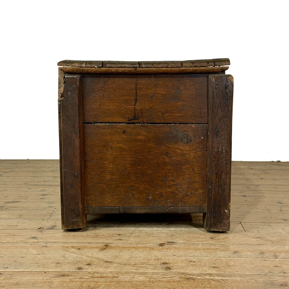A large dark oak coffer featuring the carved initials W A, the date 1647, two small carved crosses, and a central iron lockplate. View VIII
