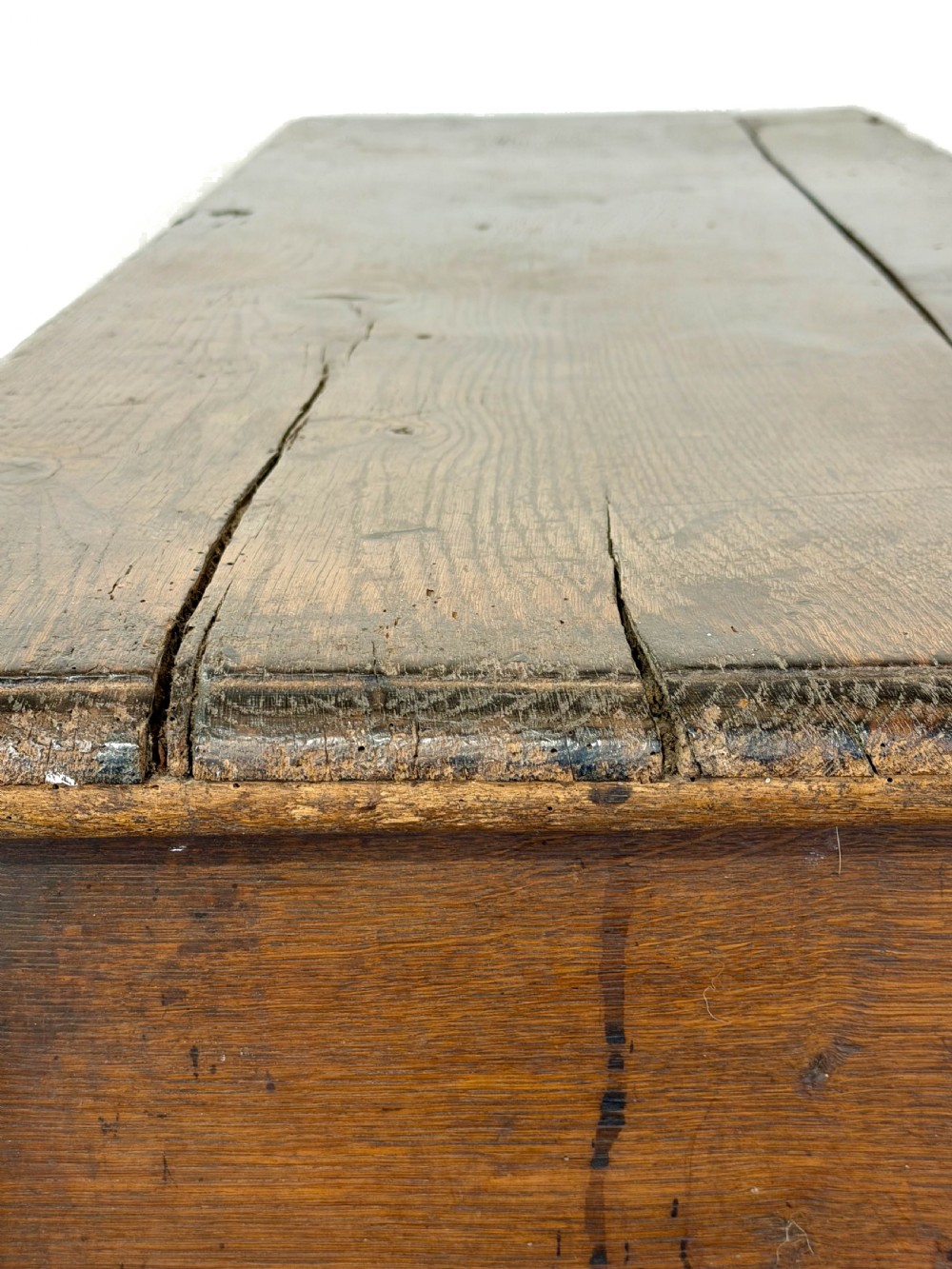 A large dark oak coffer featuring the carved initials W A, the date 1647, two small carved crosses, and a central iron lockplate. View IX