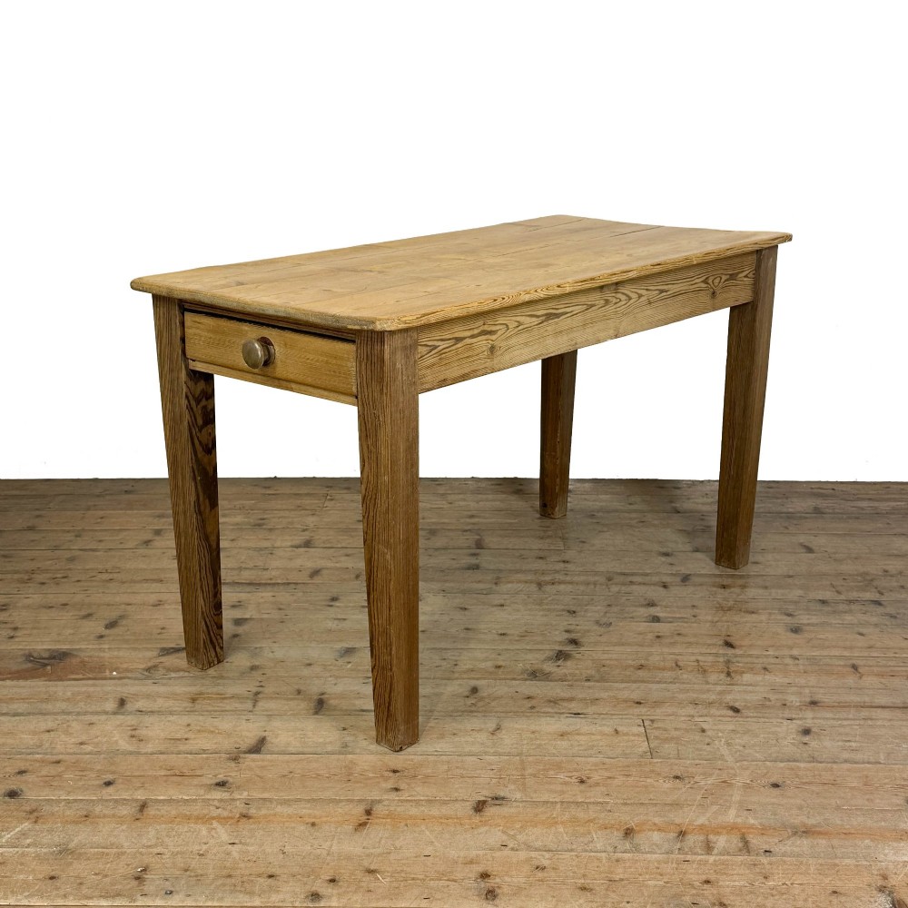 A rustic pine kitchen table featuring a single frieze drawer with a round wooden knob handle and four straight legs. View II