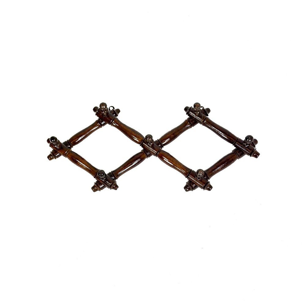 A dark brown wooden extending accordion coat rack with turned pegs arranged in a diamond lattice frame. View II