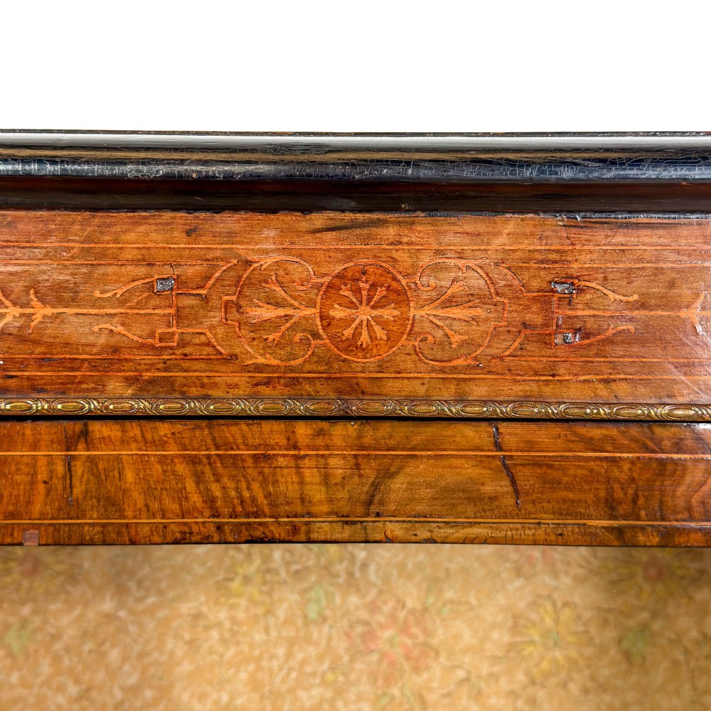A Victorian inlaid walnut pier cabinet featuring a single glazed door, ormolu brass mounts, floral interior lining, and two interior shelves. View XI