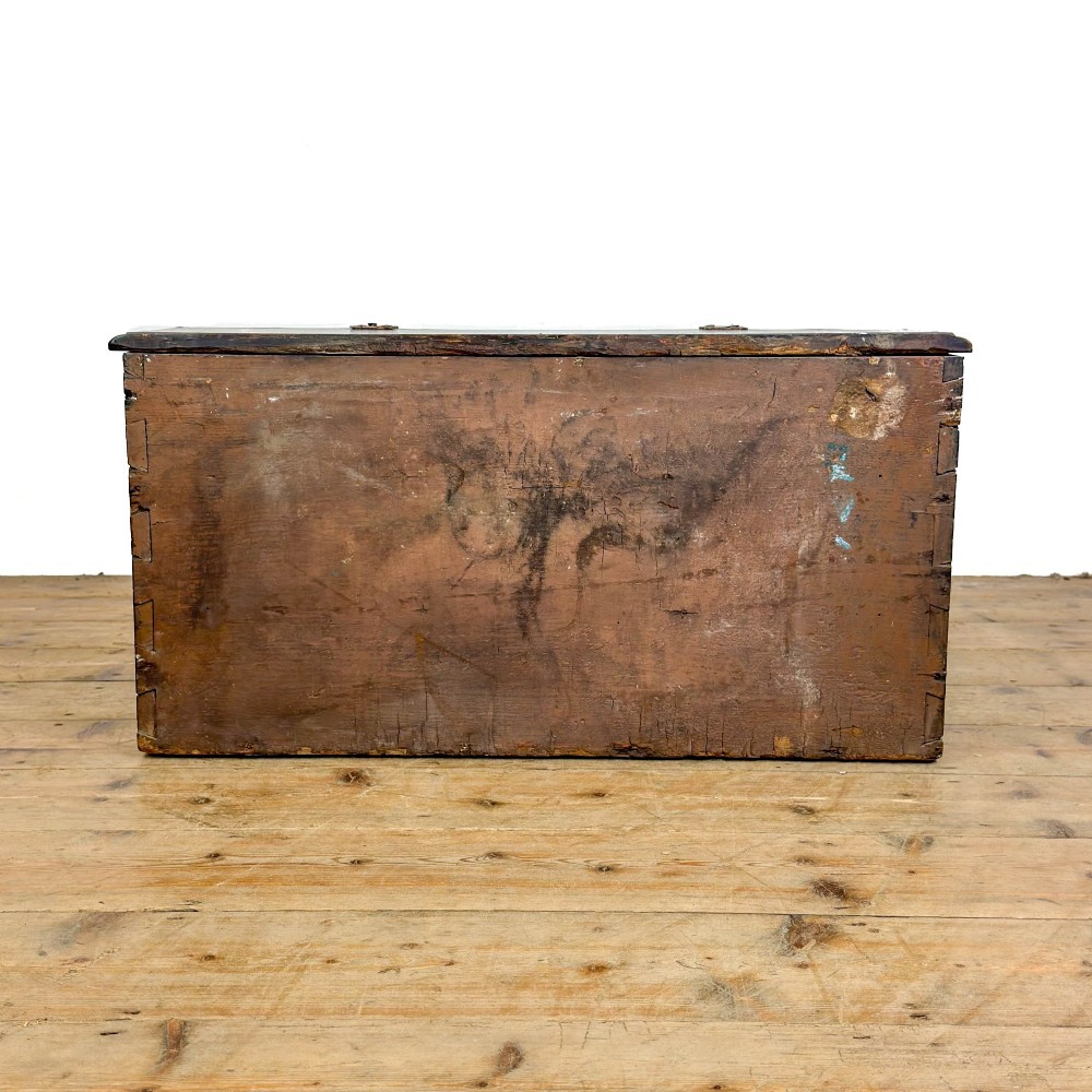 A dark brown oak bible box featuring a sloped hinged lid with a wooden rest ledge and an iron lockplate. View VIII